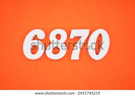 Orange felt is the background. The numbers 6870 are made from white painted wood.