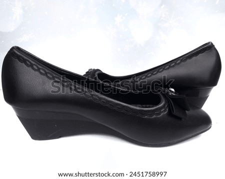 black shoes for women on the white background  Royalty-Free Stock Photo #2451758997