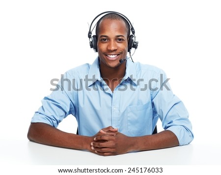 Call center operator man with headsets working.