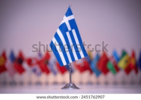 Greece flag with a gray and clean background.