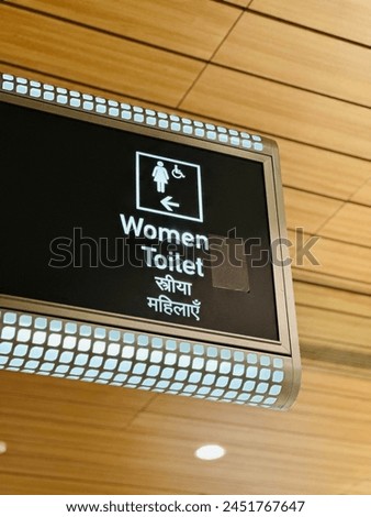 Close up of women toilet sign board at the airport