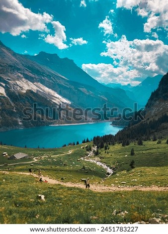 The stunning beauty of Oeschinen Lake in Switzerland, a must see and bucket list moment  Royalty-Free Stock Photo #2451783227