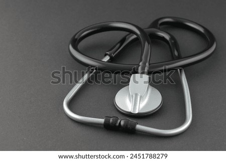 Black Stethoscope on Black Background