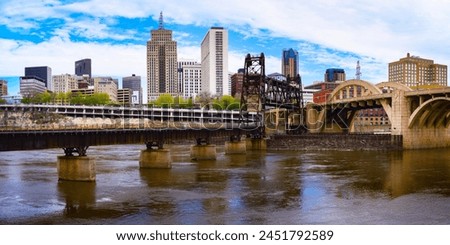 St. Paul City in Minnesota, skyline, skyscrapers, and railroad over Mississippi River in the Upper Midwestern United States