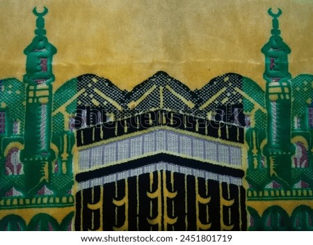 prayer mat with colored Kaaba images