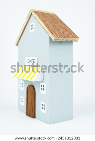 Wooden house on white background, small house, toy house.