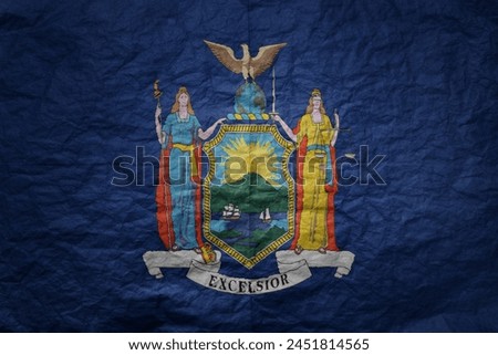 colorful big national flag of new york state on a grunge old paper texture background