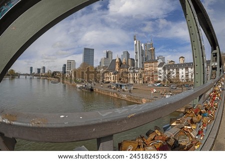 Picture of the Frankfurt skyline with the Iron Bridge during the day