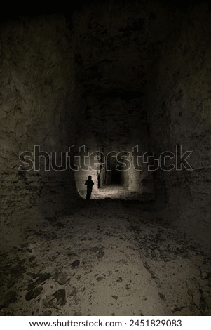 Abandoned and collapsed mine quarry in darkness Royalty-Free Stock Photo #2451829083