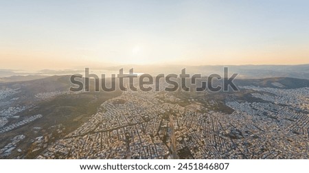 Athens, Greece. Panorama of the capital of Greece during sunset. Roofs of houses. Aerial view