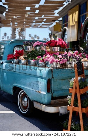 Vintage truck with a bed full of flowers