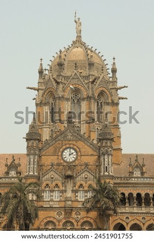 Chhatrapati Shivaji Terminus (CST), formerly known as Victoria Terminus, stands as an iconic landmark in the bustling cityscape of Mumbai, India. Royalty-Free Stock Photo #2451901755