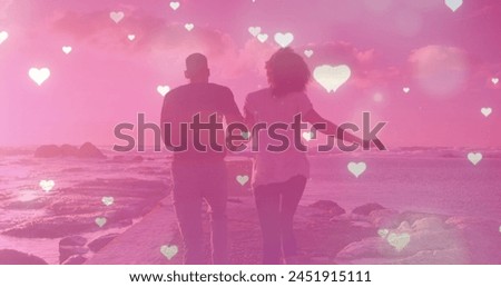 Image of heart icons over african american couple running. Spending time together and digital interface concept digitally generated image.
