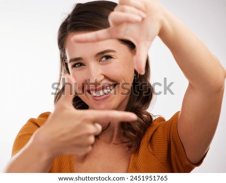 Selfie, hands and portrait of woman in studio with creative, perspective or shooting on white background. Finger, frame or photographer with profile picture, photography or screenshot, filter or sign