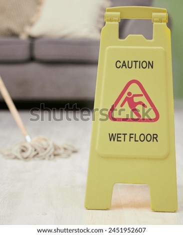 Warning, sign and mop with wet floor for cleaning, service or safety for slip hazard in interior. Icon, danger and board with symbol, text and office for hygiene, wellness and stop bacteria in lounge