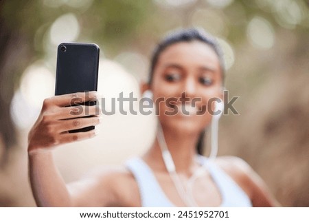 Fitness, selfie and woman hand in park for training, profile picture or running photography in nature. Sports, smartphone and health influencer in forest for live streaming, blog or content creation