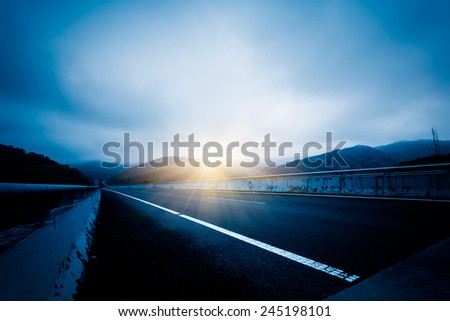 freeway with sky background.