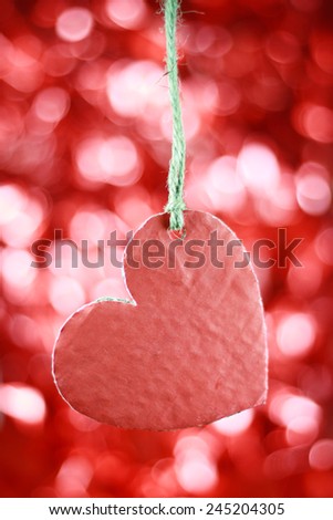 heart on the red  bokeh background 