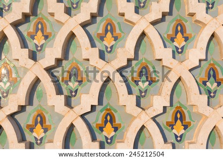 The Arabian wall tile pattern in marble. Detail of architecture in Marrakesh, Morocco