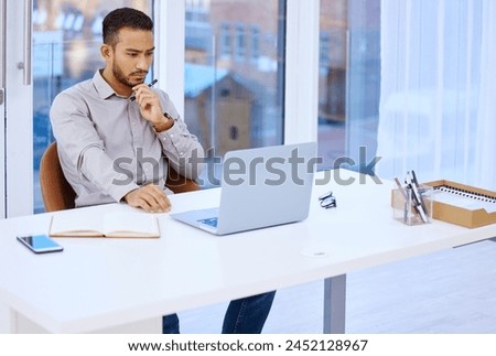Journalist, man and reading with laptop in office for ideas, lead or story at media company. Staff writer, editor and employee by computer, notebook and progress in research with info for newsletter