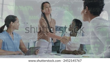 Image of financial data processing over diverse business people at office. Global finances, business and digital interface concept digitally generated image.