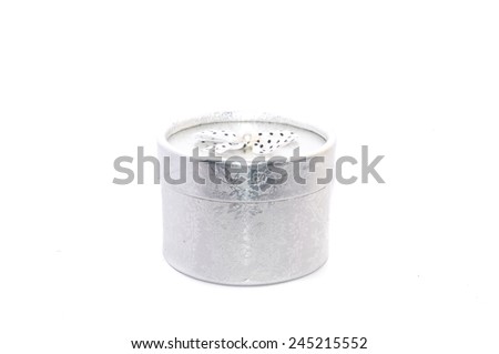 Silver gift box with a ribbon on white background