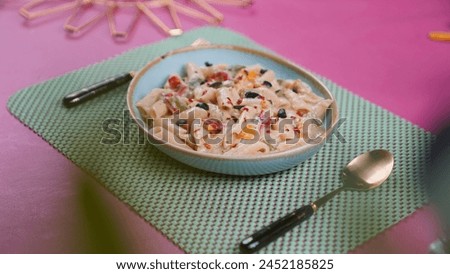 Pasta Preparation- Delicious Recipe Decorated and Served on a beautiful Pink Matt. An International Recipe - Different Angle Pictures