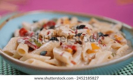 Pasta Preparation- Delicious Recipe Decorated and Served on a beautiful Pink Matt. An International Recipe - Different Angle Pictures