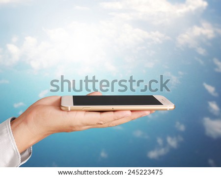 Close up hand holding smart phone 