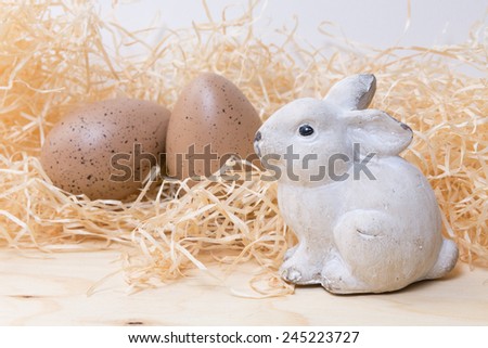 easter decoration with stone rabbit