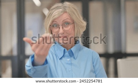 Portrait of Confident Senior Old Woman inviting People