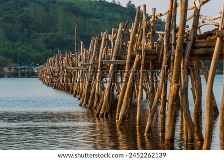 View of Ong Cop bridge or Tiger wooden bridge, Vietnam's longest wooden bridge in Chi Thanh district, Phu Yen province, Vietnam. Travel and landscape concept.