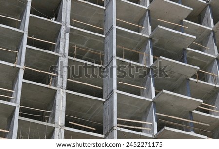 Floor Slabs And Concrete Walls Of Modern Apartment House In Construction Process. Stock Photo For Construction Industry Backgrounds
