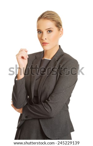 Beautiful businesswoman standing in confident pose.