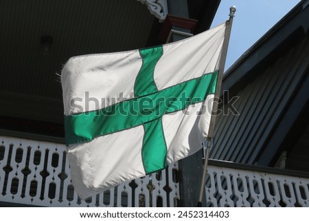 GREEN CROSS OF FLORIDA FLAG of Republic of the Floridas--established by Gregor McGregor on Amelia Island, FL on 6.29.1817 and seized by privateer Louis-Michel Aury on 9.21.1817 in the name of Mexico. Royalty-Free Stock Photo #2452314403