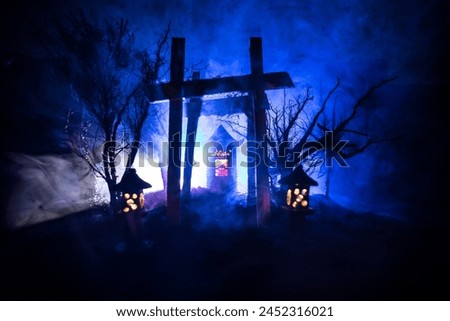 Creative artwork decoration. Abstract Japanese style wooden tunnel at night. Night scene in fantasy forest. Selective focus Royalty-Free Stock Photo #2452316021