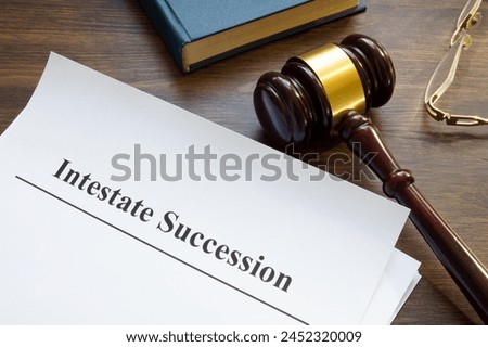 Intestate succession, gavel and book on the table.
