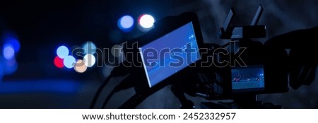 video recording of emergency scene with video camera for news, stock photo