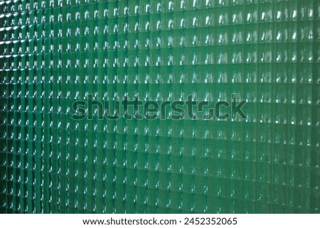 Perspective view of window glass with square embossed pattern.Kaohsiung City, Taiwan.For branding,calender,postcard,screensave,wallpaper,poster,banner,cover,website.High quality photography