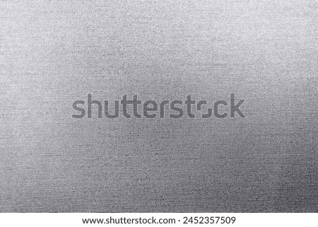 Close-up of silver fabric texture for background.  Royalty-Free Stock Photo #2452357509