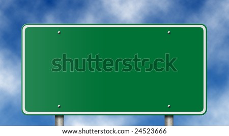 Blank freeway sign against a blue sky.