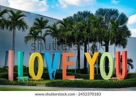 huge i love you letters child playing around