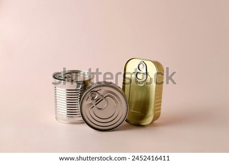 Three Shape Food Can on Pink Background, Food Stock Concept. Copy Space for Text 