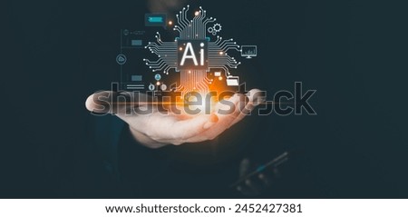 Businessman is showing concept of future technology and internet connection network with AI as controller. A graphic floated in the air on his hand. Data center network concept. Royalty-Free Stock Photo #2452427381