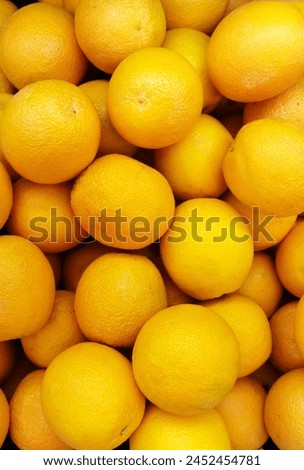 Flat Lay Photo of an Organized Orange at Market Royalty-Free Stock Photo #2452454781