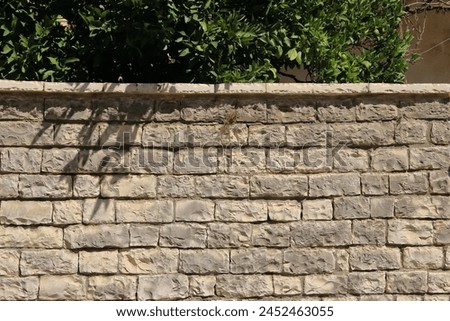 a natural yellow stone wall