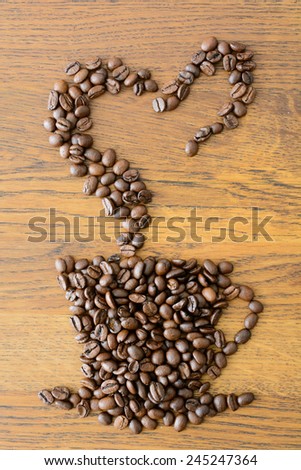 Coffee beans in shape of cup and heart