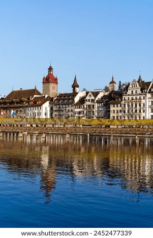 Scenic view of skyline of the old town of Swiss City of Lucerne with famous Chapel Bridge on a sunny spring morning. Photo taken April 11th, 2024, Lucerne, Switzerland.