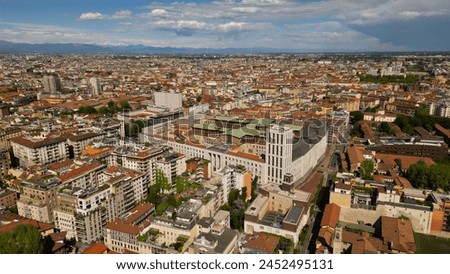 Milan City Court view from above. Milan cityscape against a background of blue sky, view from above in sunny weather. High quality aerial photo