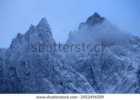 Trollveggen mountains in winter (Norway). Royalty-Free Stock Photo #2452496509